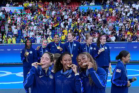 2024 Paris Olympics women's Football: Team United States pose with gold medal